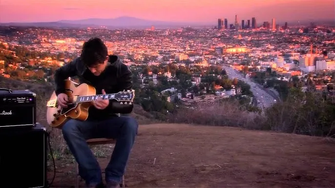 Guitarist Overlooking Los Angeles at Sunset
